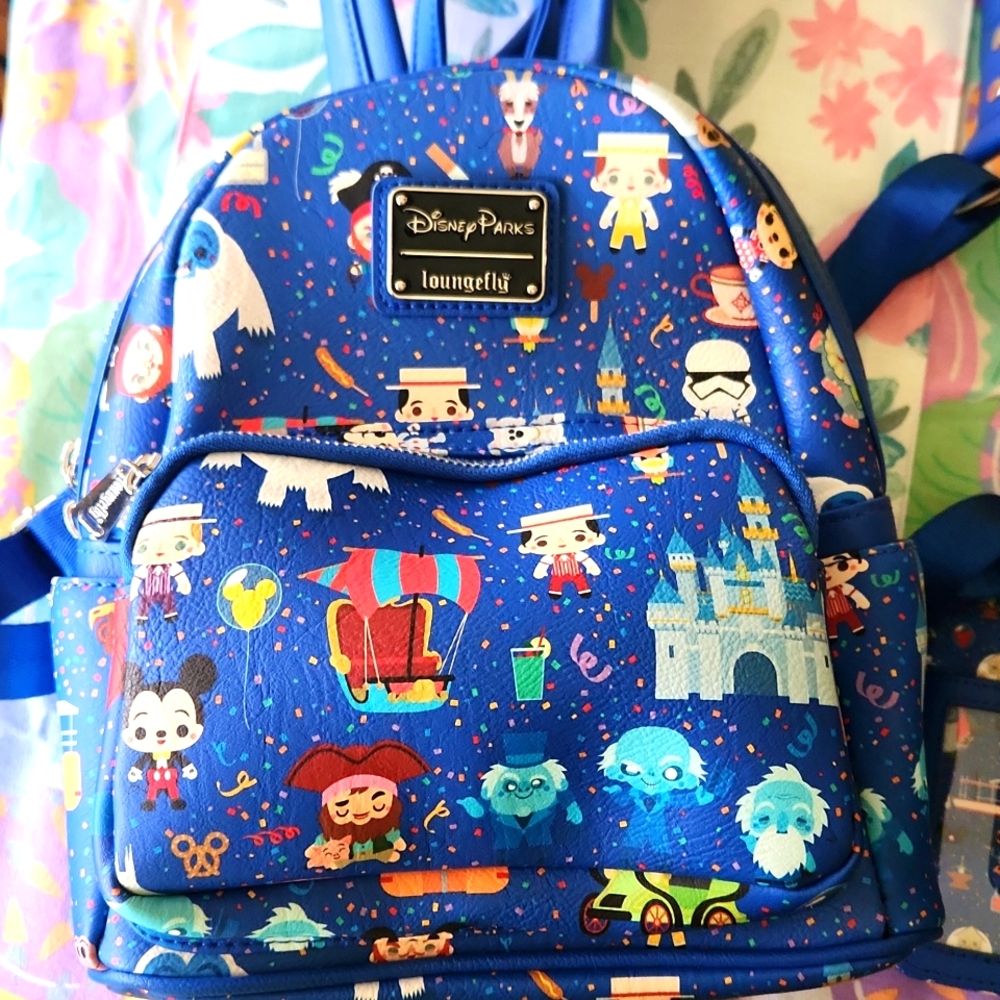 Loungefly minibackpack.  This the all over Disney park design.